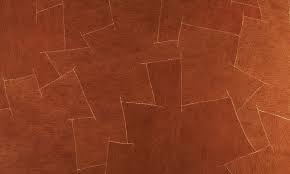 Close-up of Olubugo barkcloth texture used as canvas material